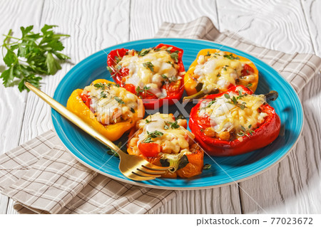 chickpea stuffed peppers on a plate, top view 77023672