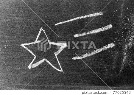 White color chalk hand drawing as star shape on blackboard or chalkboard background White color chalk hand drawing as star shape on blackboard or chalkboard background 77025543