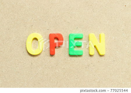 Color alphabet letter with word open on wood background Color alphabet letter with word open on wood background 77025544