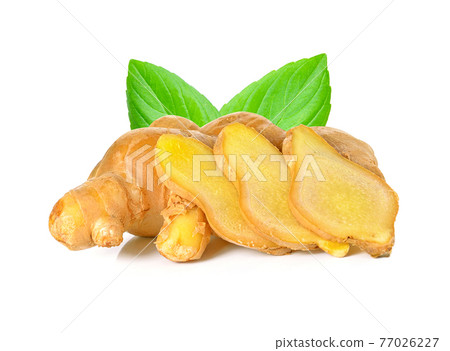 Fresh ginger rhizome with sliced and green leaves isolated on white background. 77026227