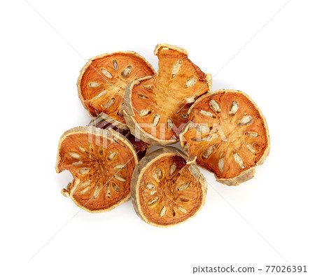 Aegle marmelos. Dry bael fruit on white background 77026391