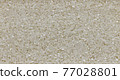 Scattered grains of round rice. 77028801