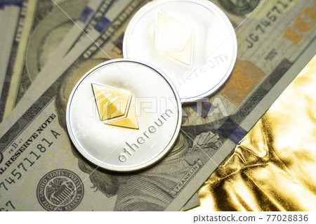 Ethereum coins with on a dollars. Trading on the cryptocurrency exchange. Cryptocurrency Stock Market Concept. Mining or blockchain technology. Business concept. Ethereum coins with on a dollars. Trading on the cryptocurrency exchange. Cryptocurrency Stock Market Concept. Mining or blockchain technology. Business concept. 77028836