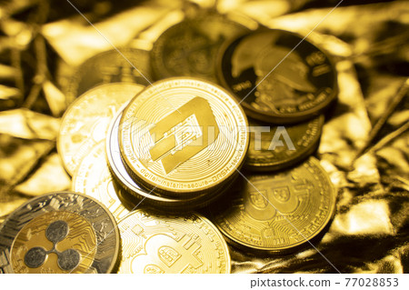 Gold Dash coins on a golden background. Trading on the cryptocurrency exchange. Cryptocurrency Stock Market Concept. Virtual money concept. Mining or blockchain technology. Business concept. 77028853