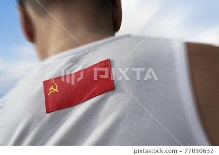 The national flag of USSR on the athlete's back The national flag of USSR on the athlete's back 77030632