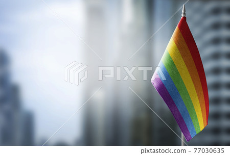 Small national flags of the lgbt on a light blurry background Small national flags of the lgbt on a light blurry background 77030635