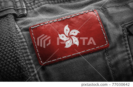 Tag on dark clothing in the form of the flag of the Hong Kong Tag on dark clothing in the form of the flag of the Hong Kong 77030642