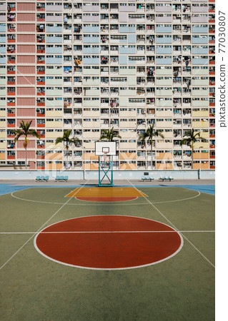 basketball court and rainbow colored building facade in HongKong basketball court and rainbow colored building facade in HongKong 77030807