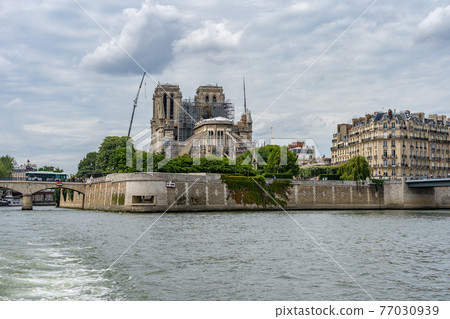 Paris Notre Dame Cathedral church after fire viewed Seine river Paris Notre Dame Cathedral church after fire viewed Seine river 77030939