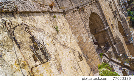 The Puente Nuevo New Bridge over Guadalevin River in Ronda The Puente Nuevo New Bridge over Guadalevin River in Ronda 77033389
