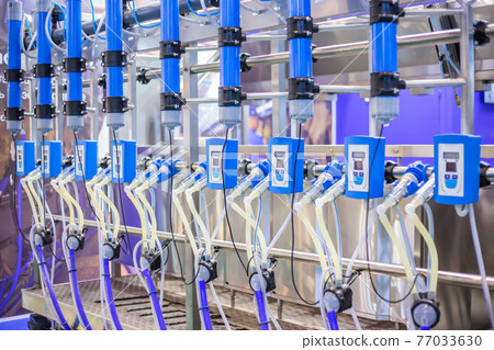 Automated goat milking suction machine with teat cups at exhibition Automated goat milking suction machine with teat cups at exhibition 77033630