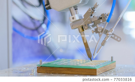 Process of selective soldering components to printed circuit board at factory 77033816