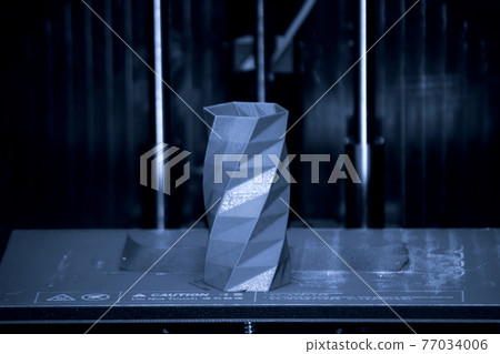 Objects printed by 3d printer. Automatic three dimensional 3d printer Objects printed by 3d printer. Automatic three dimensional 3d printer 77034006