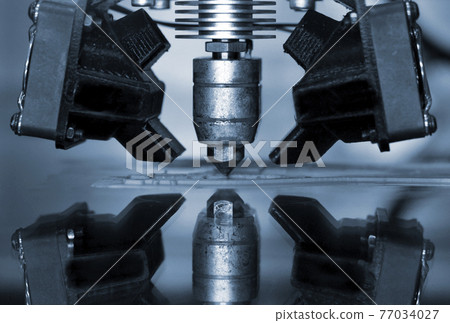 3D printer print isolated objects on mirror reflective surface close-up. 3D printer print isolated objects on mirror reflective surface close-up. 77034027