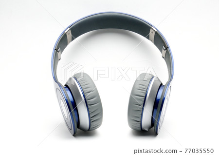 Blue and silver modern headphones on a white background Blue and silver modern headphones on a white background 77035550