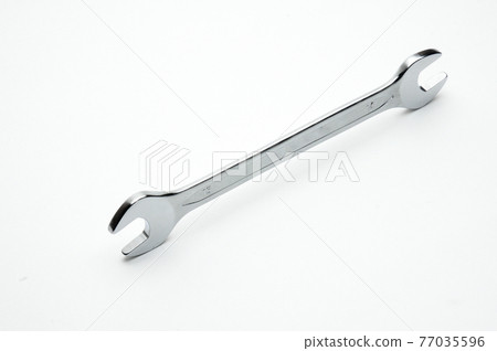 Wrench for nuts and bolts on a white background 77035596
