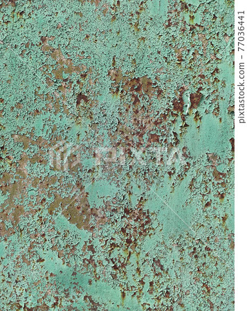 Rusty metal background with streaks of rust. Corroded metal background. Rust stains. Rystycorrosion. 77036441
