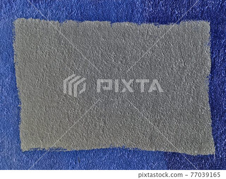 textured colored facing plaster of the street wall of the building 77039165