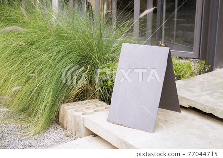 Label board outside at restaurant and coffee shop 77044715