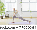 Women doing yoga in the living room Fitness Beauty 77050389