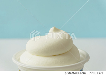 A cup of ice cream. Soft cream A cup of ice cream. Soft cream 77051371