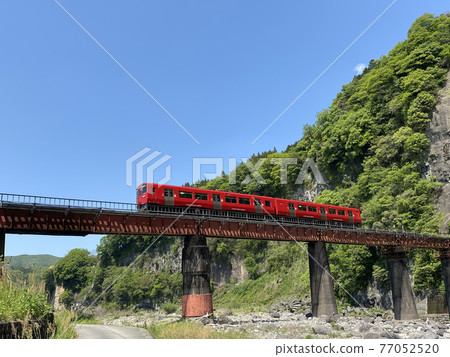Iwato scenery Hyakueda iron bridge and red train Iwato scenery Hyakueda iron bridge and red train 77052520