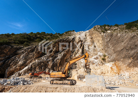 Excavators with Jackhammer in a Marble Quarry - Apuan Alps Tuscany Italy 77052940