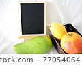 Several types of mango and blackboard 77054064
