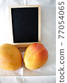 Mango and blackboard 77054065