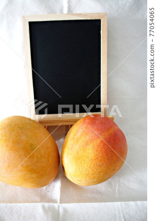 Mango and blackboard Mango and blackboard 77054065