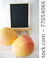 Mango and blackboard 77054066