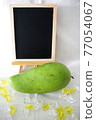 Green mango, decoration and blackboard 77054067