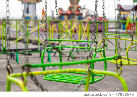 Kyiv, Ukraine - March, 22, 2020: Empty children's attraction. Quarantine during COVID-19. 77059570
