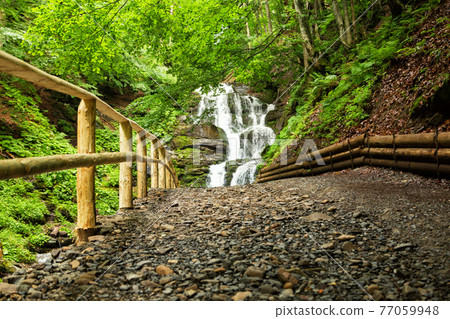 small waterfall of mountain river small waterfall of mountain river 77059948