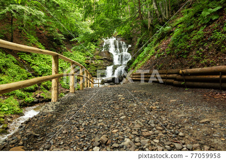 small waterfall of mountain river small waterfall of mountain river 77059958