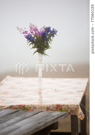 Bouquet of wild flowers on the table rustic Bouquet of wild flowers on the table rustic 77060189