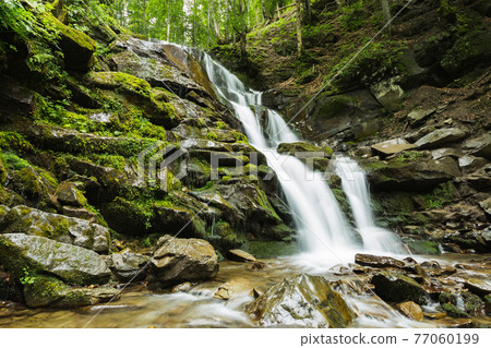 beautiful waterfall of mountain river beautiful waterfall of mountain river 77060199