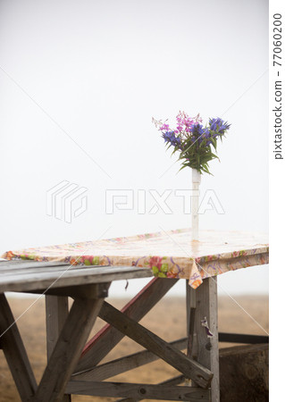Bouquet of wild flowers on the table rustic Bouquet of wild flowers on the table rustic 77060200