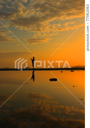Sunset and reflection on Shinmaiko coast 77062063