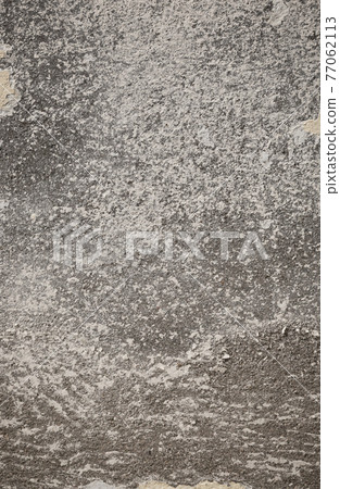 An old grunge texture, gray concrete wall with spotted surface. 77062113