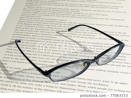 Glasses and texts Reading / business image 77063553