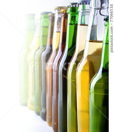 colorful beer bottle necks close-up, selective focus, copy space 77066538