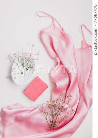 Spa composition with pink soap bar with ceramic soap dish, silk babric and flowers Spa composition with pink soap bar with ceramic soap dish, silk babric and flowers 77067476