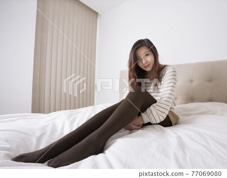 Pretty asian girl in the UK 77069080