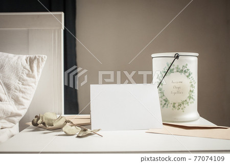 blank greeting card  invitation mockup with craft paper envelope  feminine still life composition 77074109