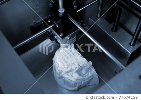 3D printer prints the form of molten plastic white. 3D printer prints the form of molten plastic white. 77074159