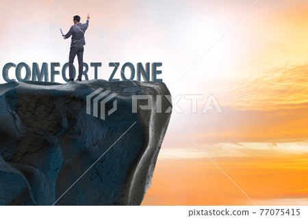 Businessman in the concept of stepping out of comfort zone Businessman in the concept of stepping out of comfort zone 77075415
