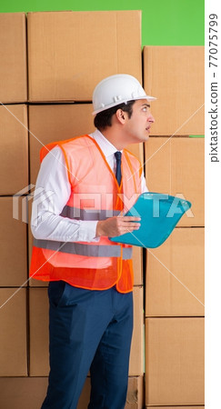 Man contractor working in box delivery relocation service Man contractor working in box delivery relocation service 77075799