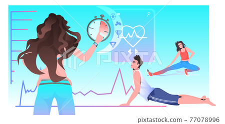 young people doing sport exercises with female fitness trainer online cardio training workout concept young people doing sport exercises with female fitness trainer online cardio training workout concept 77078996