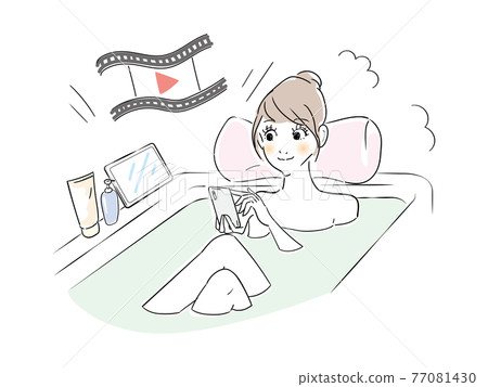 Cute woman bath time video viewing 77081430